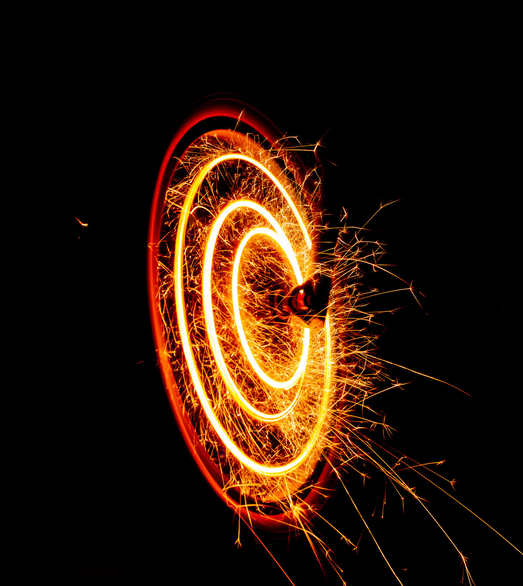 Spinning bike wheel with sparklers.
